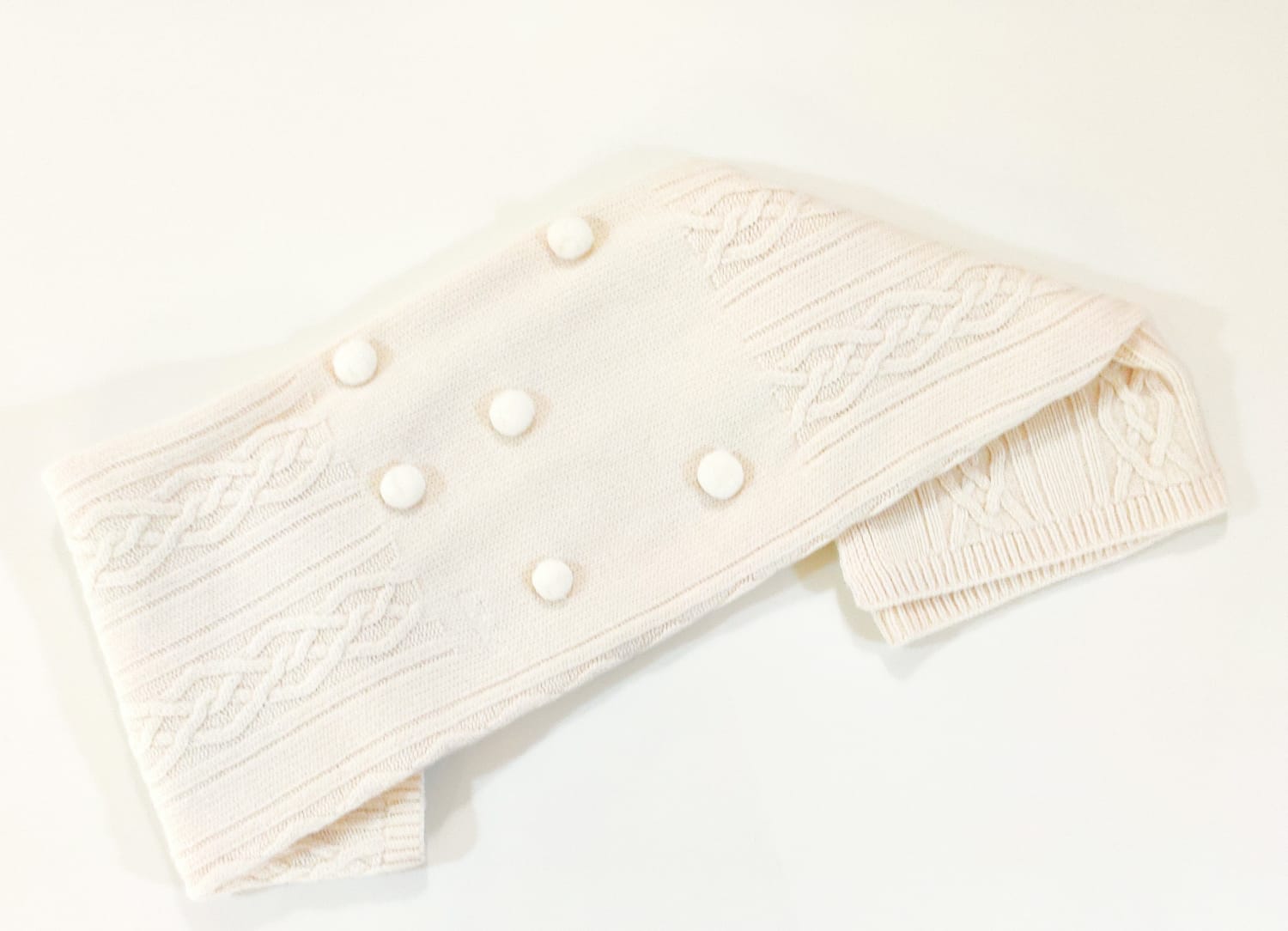 Coperta in filo con pon pon e trecce LE BEBE