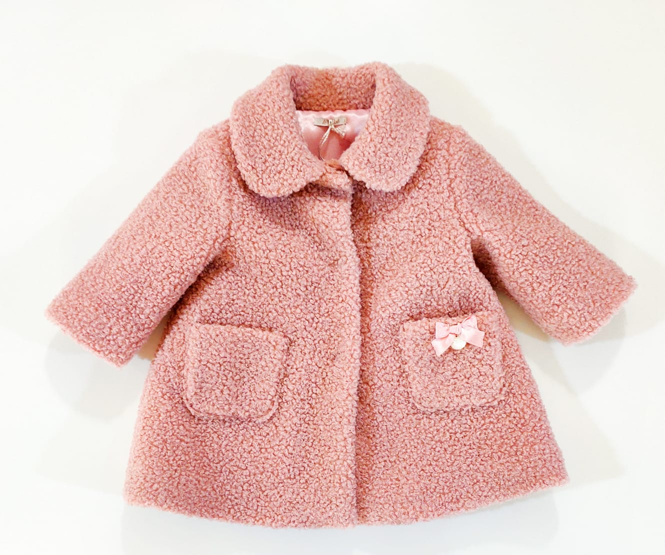 Cappottino lungo in pelliccia con taschini taglio vivo LE BEBE 