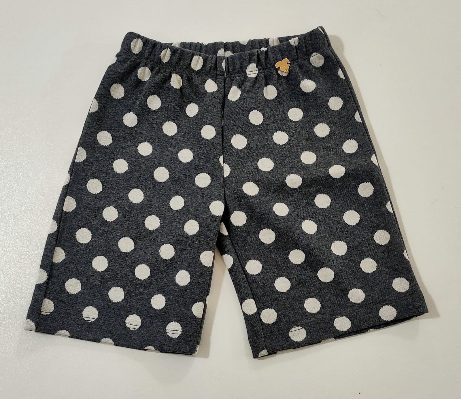 Pantalone largo a pois con dettaglio ciondolo a forma di cuore sul davanti LIU JO 