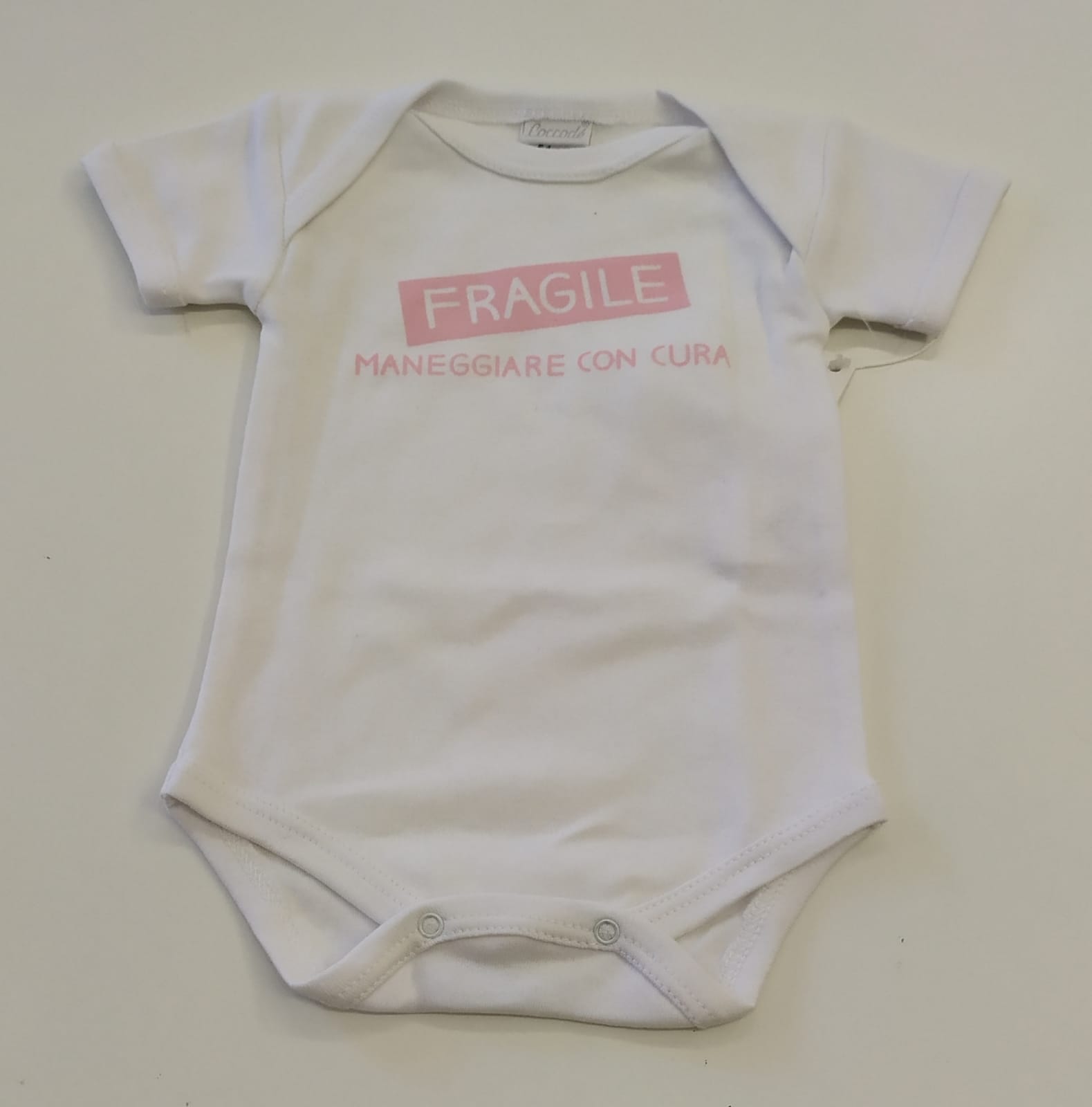 Body bianco con scritte rosa COCCODE 