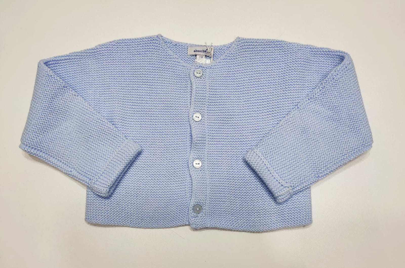 Cardigan corto in filo con apertura a bottoncini ABSORBA