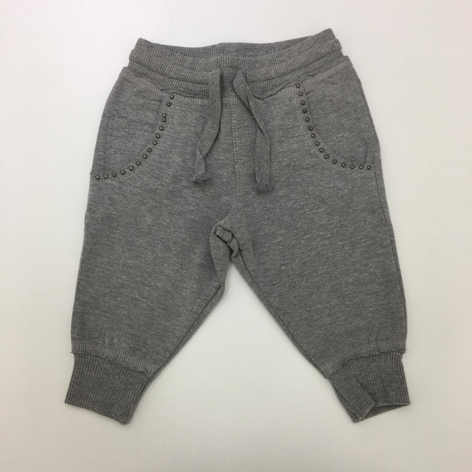 Pantalone tuta con borchie su bordo tasche MISS GRANT 